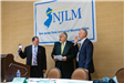 Ray Heck and William Chegwidden sworn in by William Pikolycky at League Business Meeting.