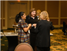 Guests mingle at the WIMG Networking Event